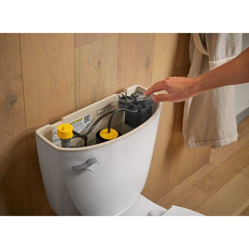 Kohler Two-piece elongated 1.28 GPF toilet - Cheap Fitting