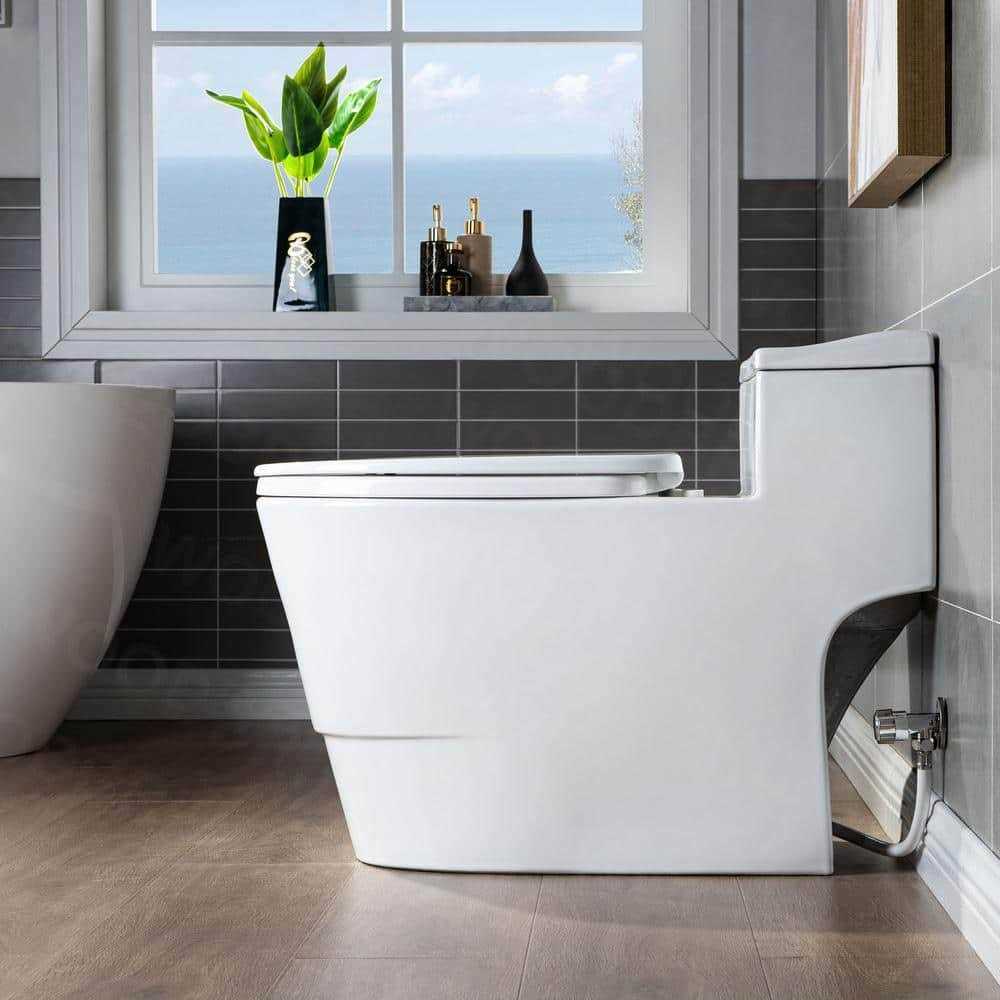 WOODBRIDGE 1-piece 1.28 GPF Conserver High Efficiency Dual Flush All-in-One Toilet with Soft Closed Seat Included in White - Cheap Fitting
