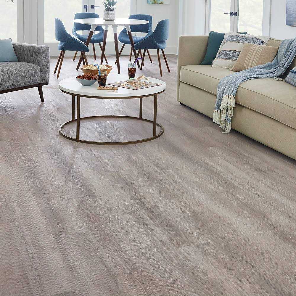 STAINMASTER Barnes Oak 7-3/32-in Wide x 6-mm Thick Waterproof Interlocking Luxury Vinyl Plank Flooring - Cheap Fitting